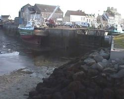 Fishing boats dry out at low water at St Vaast