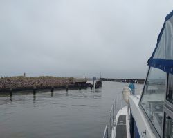 Leaving Southwold by the harbour piers
